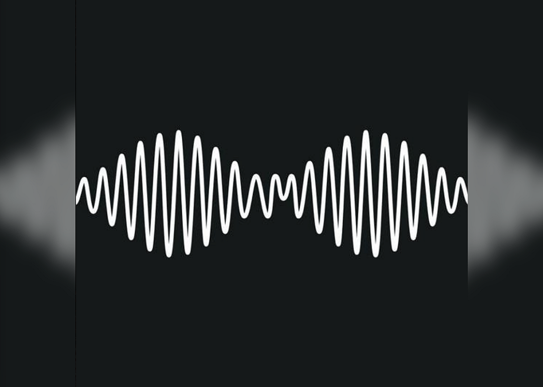 A white radiowave on a black background.