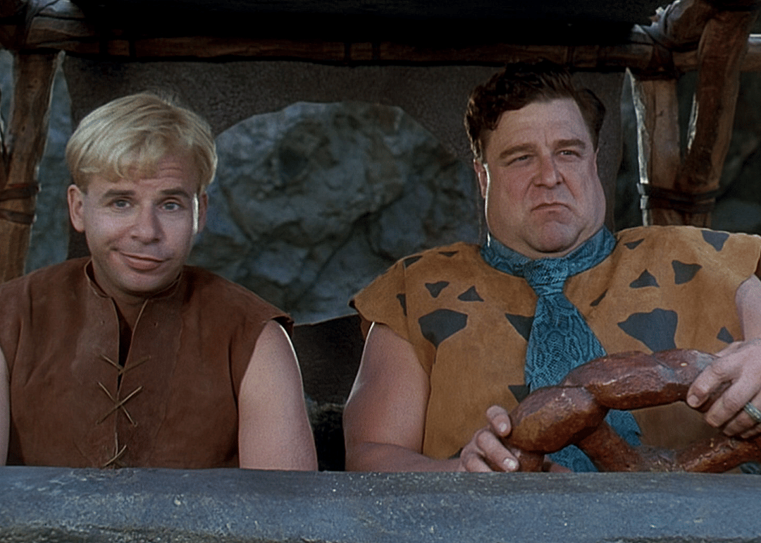 John Goodman and Rick Moranis in a scene from ‘The Flintstones’.