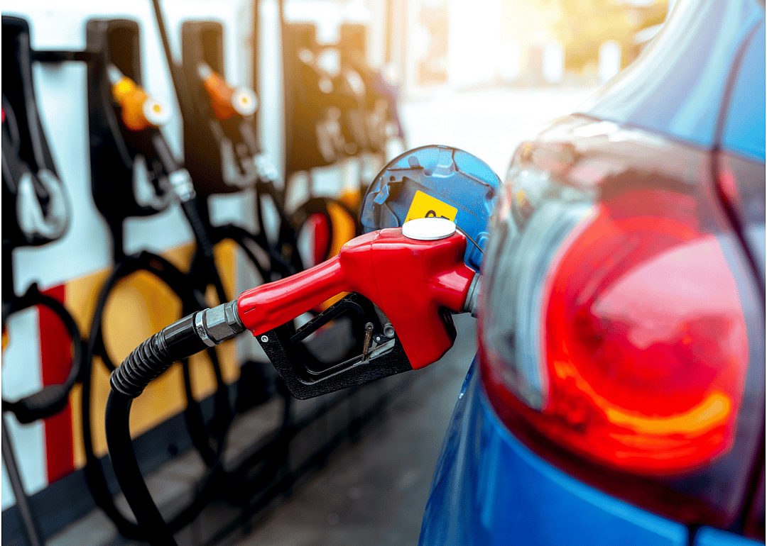 Rear view of a gas pump inserted into a car's tank