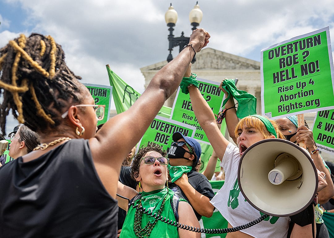 Elizabeth White leads a chant in response to the Dobbs v. Jackson Women's Health Organization ruling.