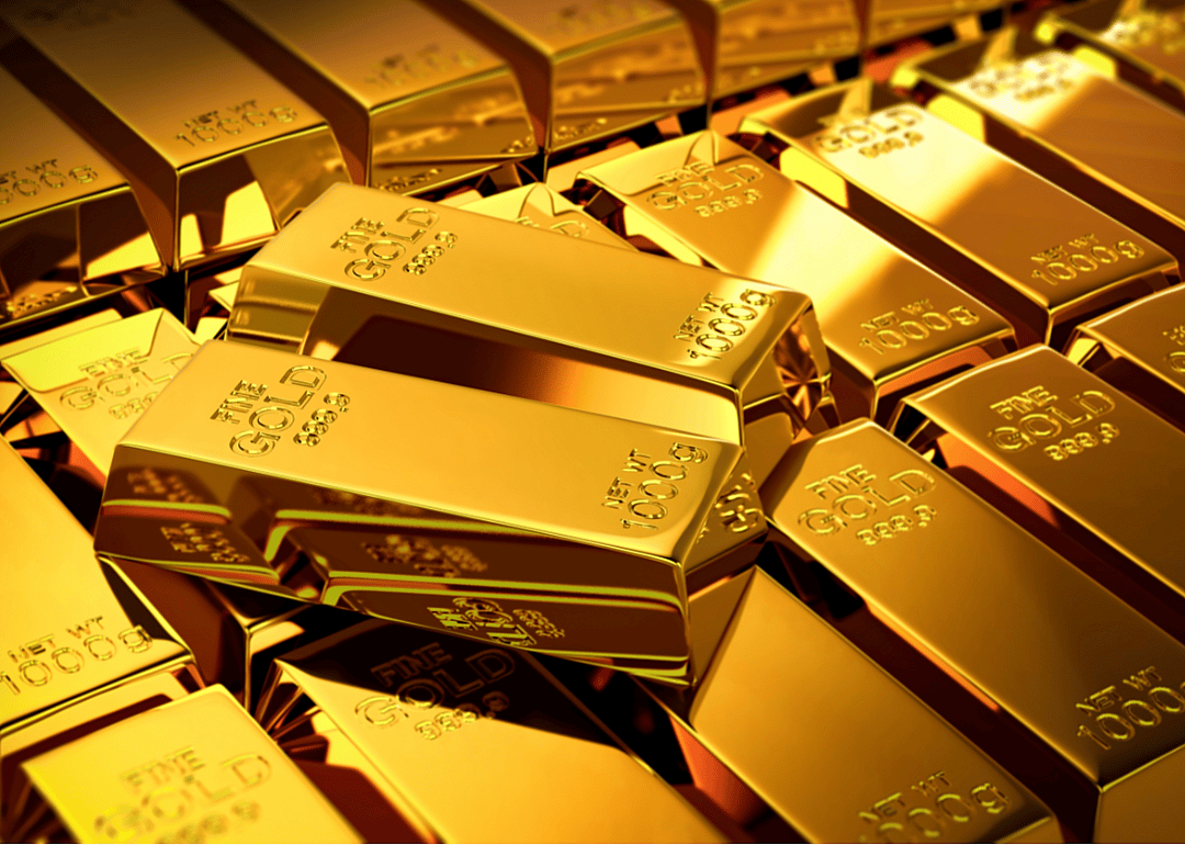Rows of stacked gold bars.