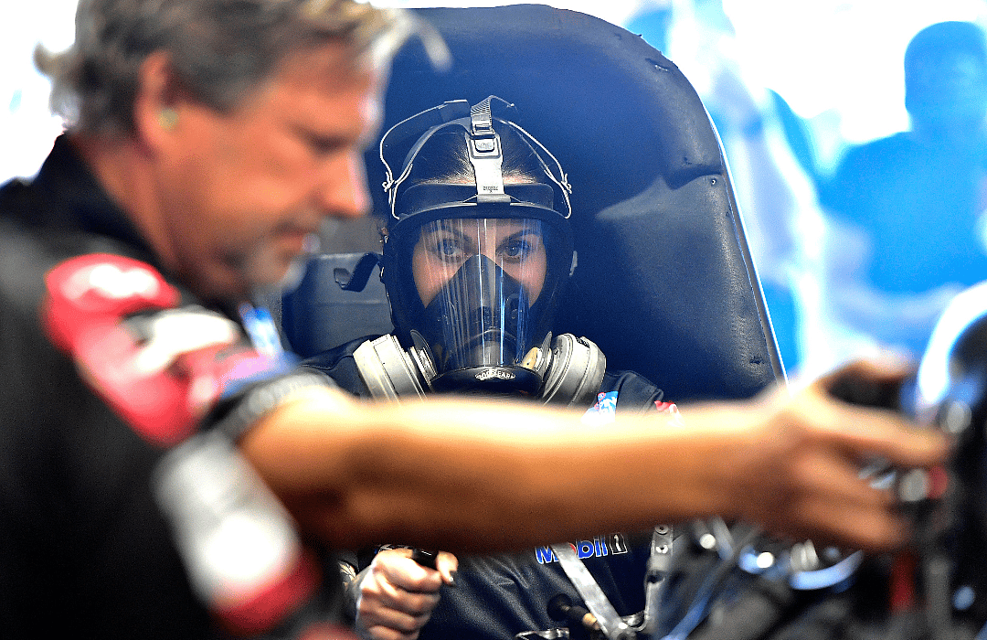 Alexis DeJoria warming up her hot rod in the pits prior to the opening round of qualifying at the season opening 62nd annual NHRA Winternationals at Auto Club Raceway at Pomona on Friday, Feb. 18, 2022.