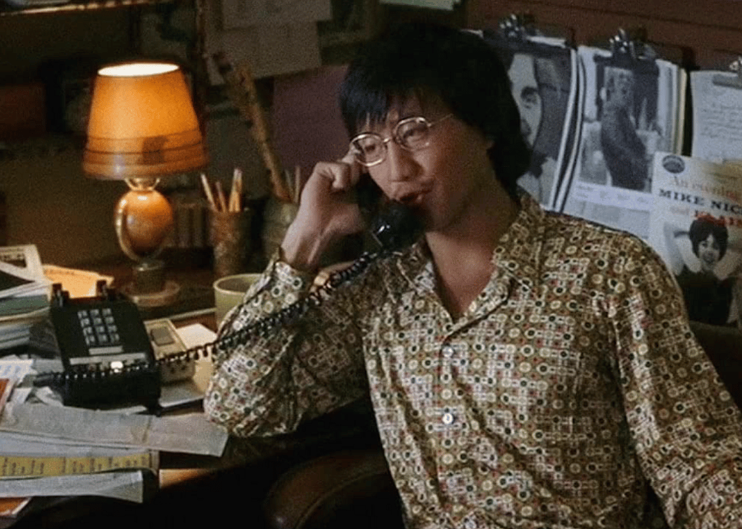 Ben Fong-Torres speaks on a telephone.