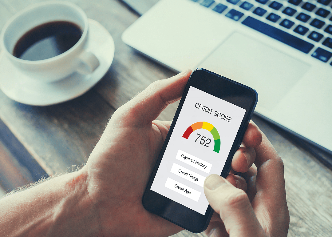 A credit score being displayed on a smartphone.