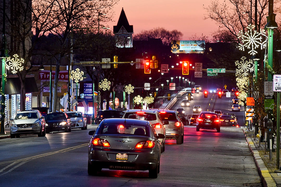 Cars on the 300 block of Penn Street looking West towards the Penn Street Bridge on Thursday, December 10, 2020, at dusk.