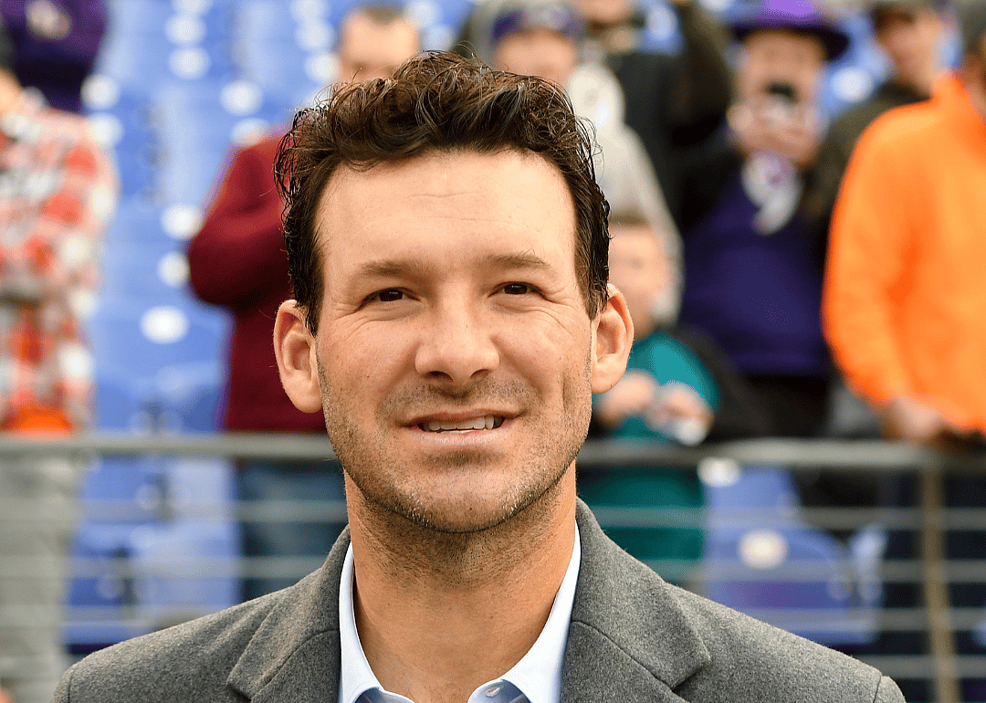 BALTIMORE, MD - DECEMBER 30: American broadcaster and former NFL quarterback, Tony Romo watches the Cleveland Browns and the Baltimore Ravens warm up prior to their game.