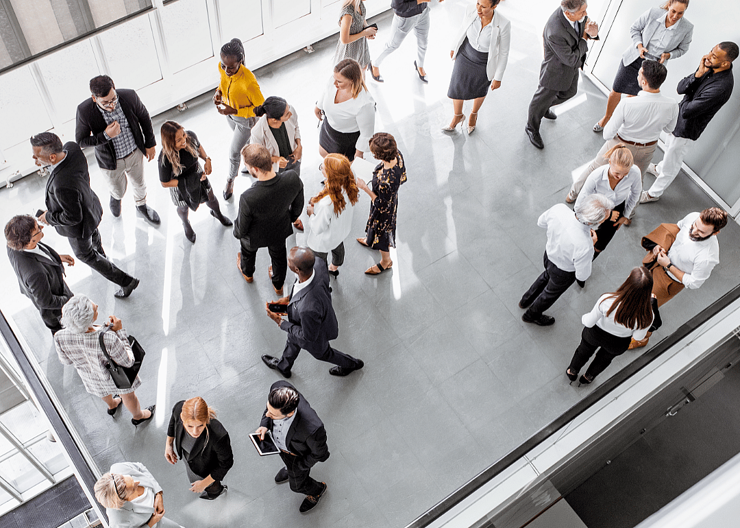 Overhead view of business people attending a networking event.