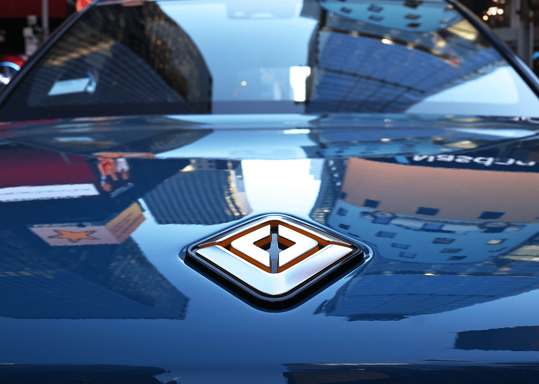 The Rivian electric truck logo is seen on a parked vehicle near the Nasdaq MarketSite building in Times Square on November 10, 2021 in New York City.