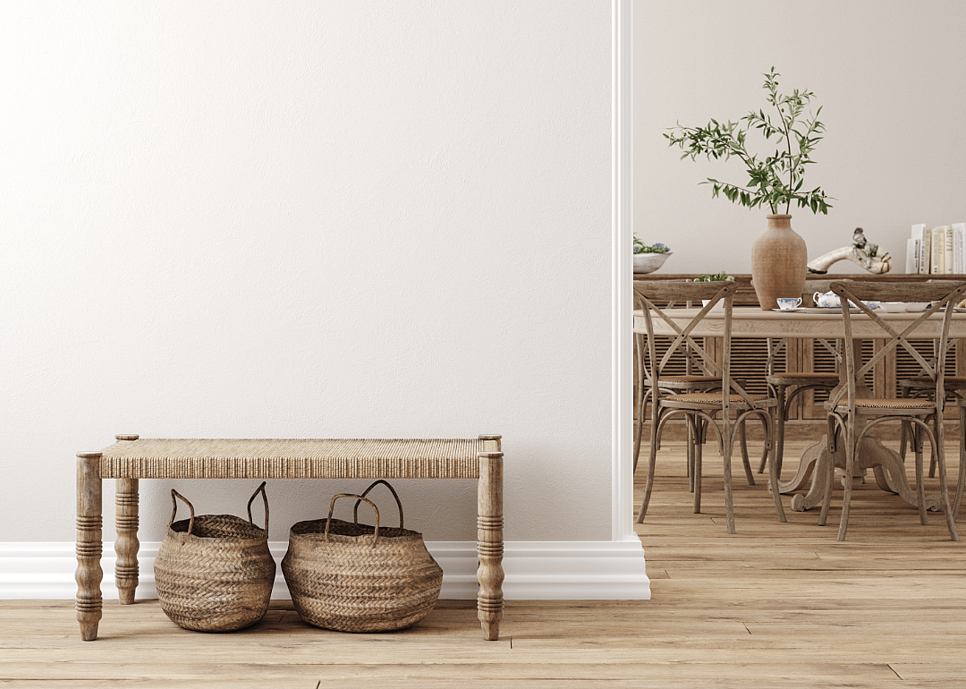 A living room with beige walls and muted color furniture