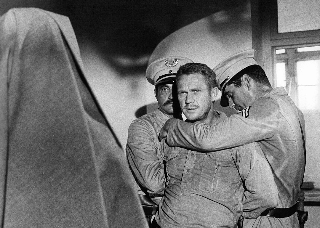 Steve McQueen is betrayed by a nun in one of his escapes, and turned over to the Columbian authorities in a scene from the film 'Papillon', 1973.