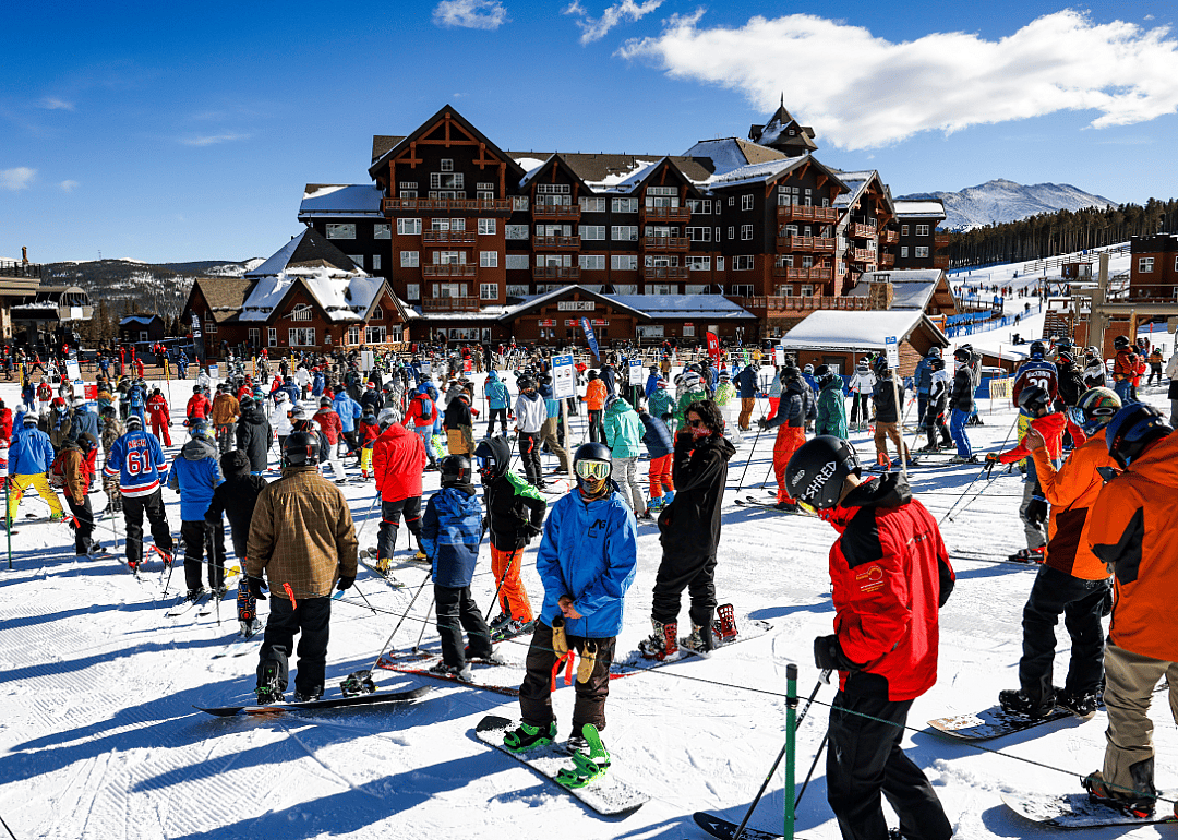 Skiers and snowboarders wait in line for the chair lift on opening day at Breckenridge Ski Resort on November 13, 2020 in Breckenridge, Colorado.