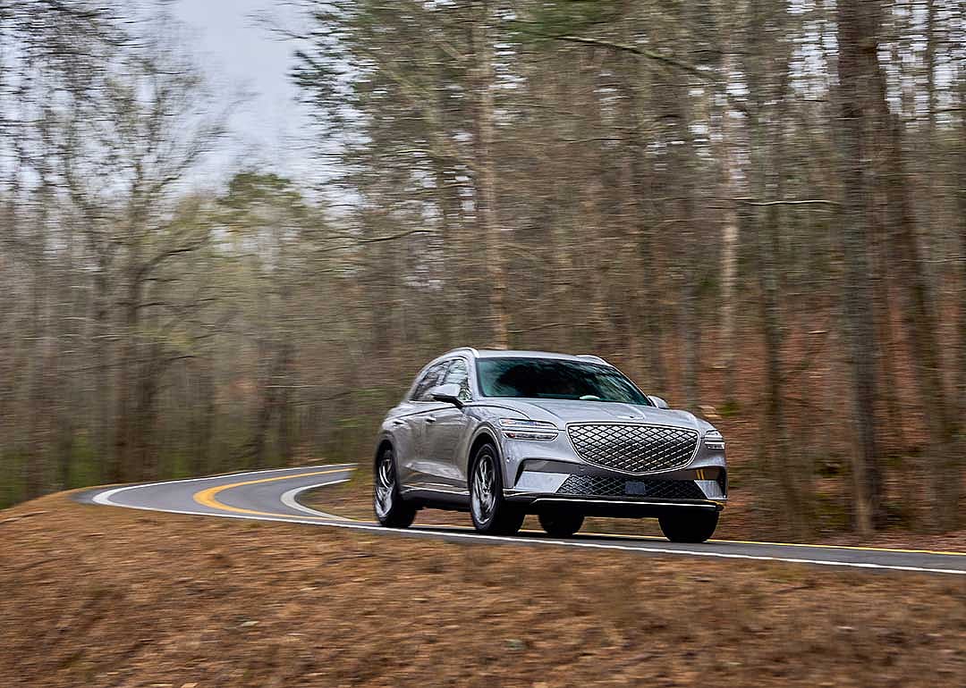 silver genesis electrified GV70 on the road