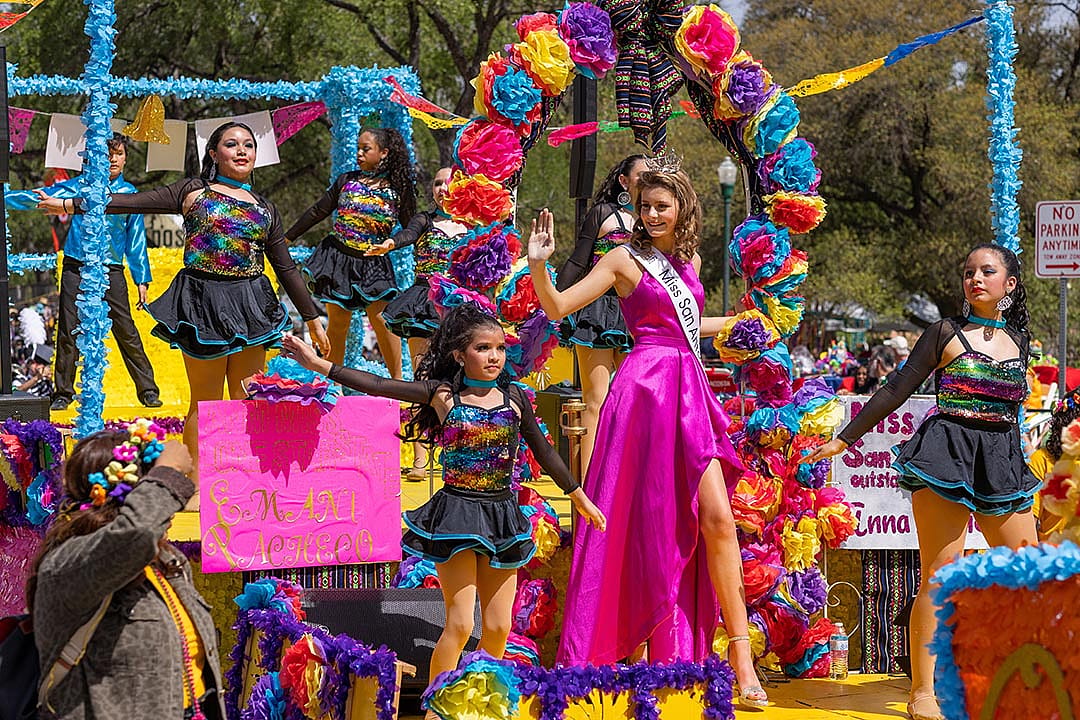 The Battle of the Flowers Parade float carrying Miss San Antonio