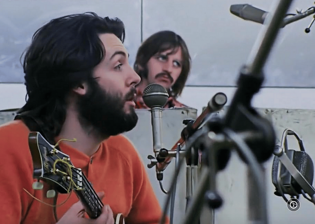 Paul McCartney and Ringo Starr in a rehearsal studio.