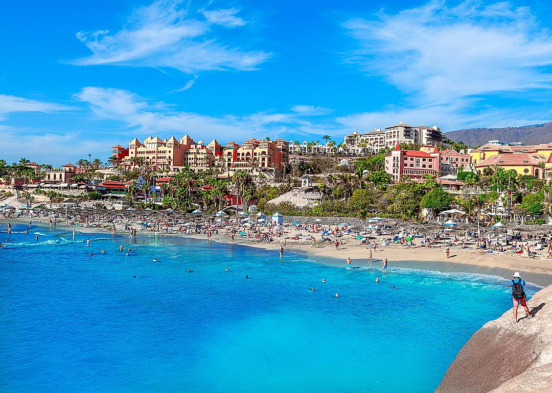 Panoramic view of El Duque beach on Adeje Atlantic coast in the summer vacation on Tenerife island.