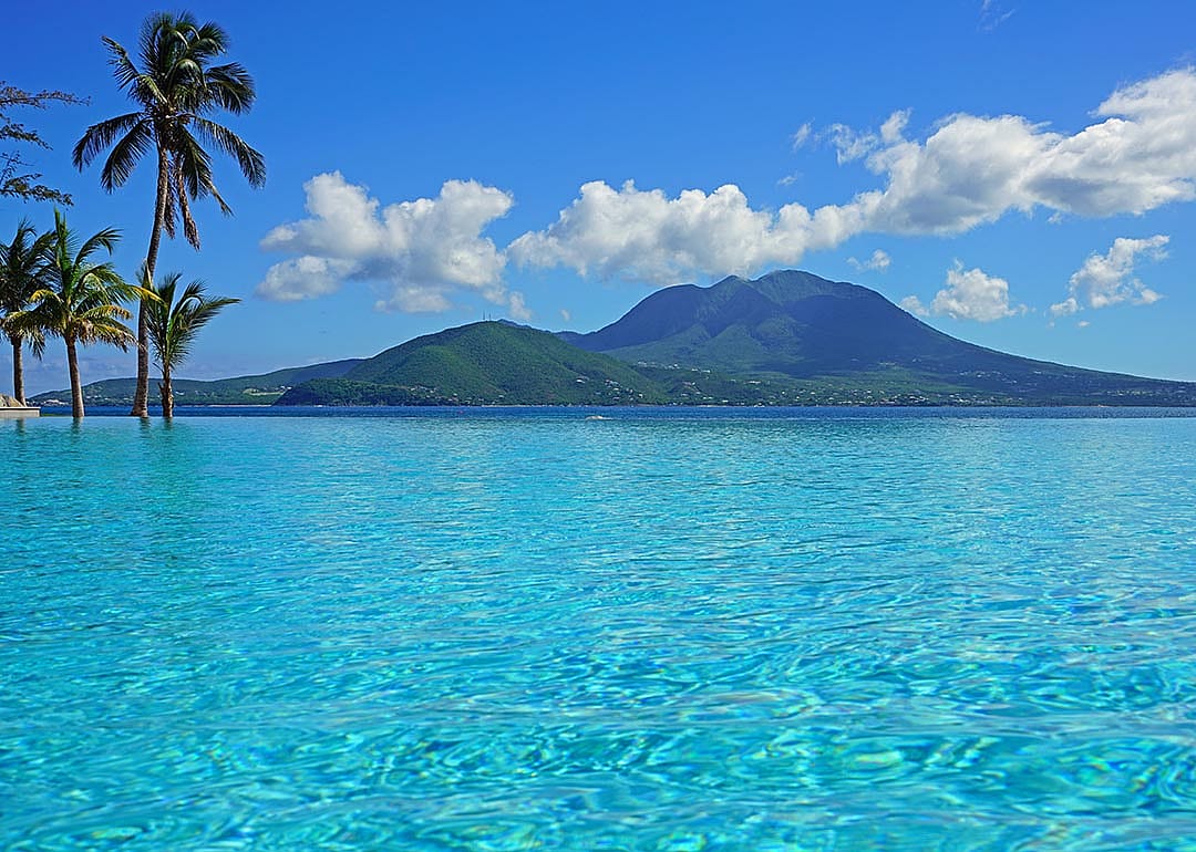 View of the Nevis Peak volcano from a swimming pool in St Kitts.