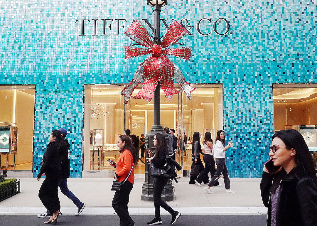 People walk past a Tiffany & Co. store at the Americana at Brand shopping center on the day after Christmas on Dec. 26, 2023 in Glendale, California.