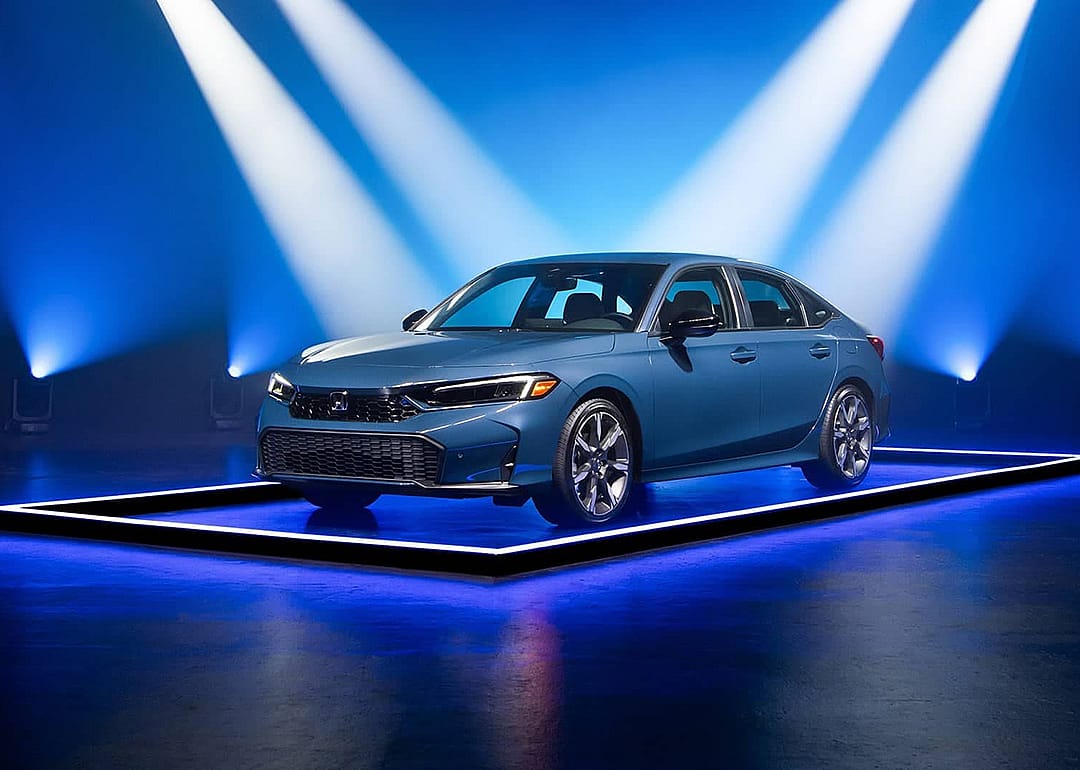 A blue 2025 Honda Civic as displayed for the Edmunds 2025 Top Rated Awards.