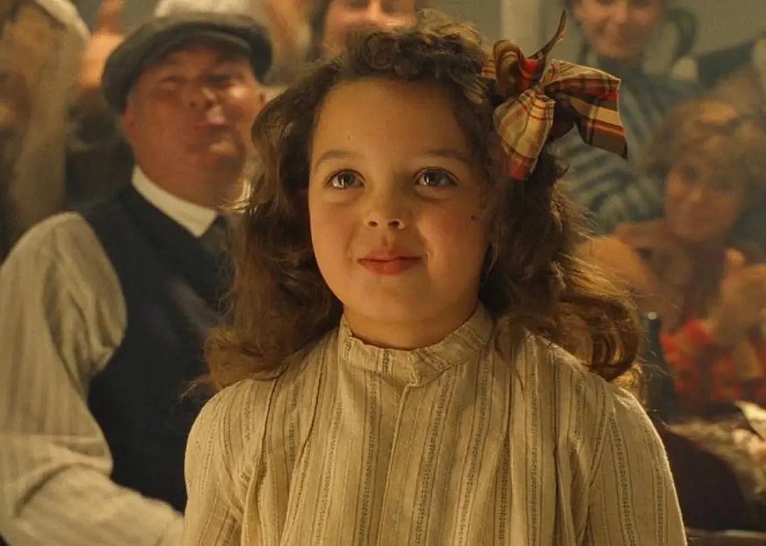 Alexandrea Owens-Sarno as Cora.