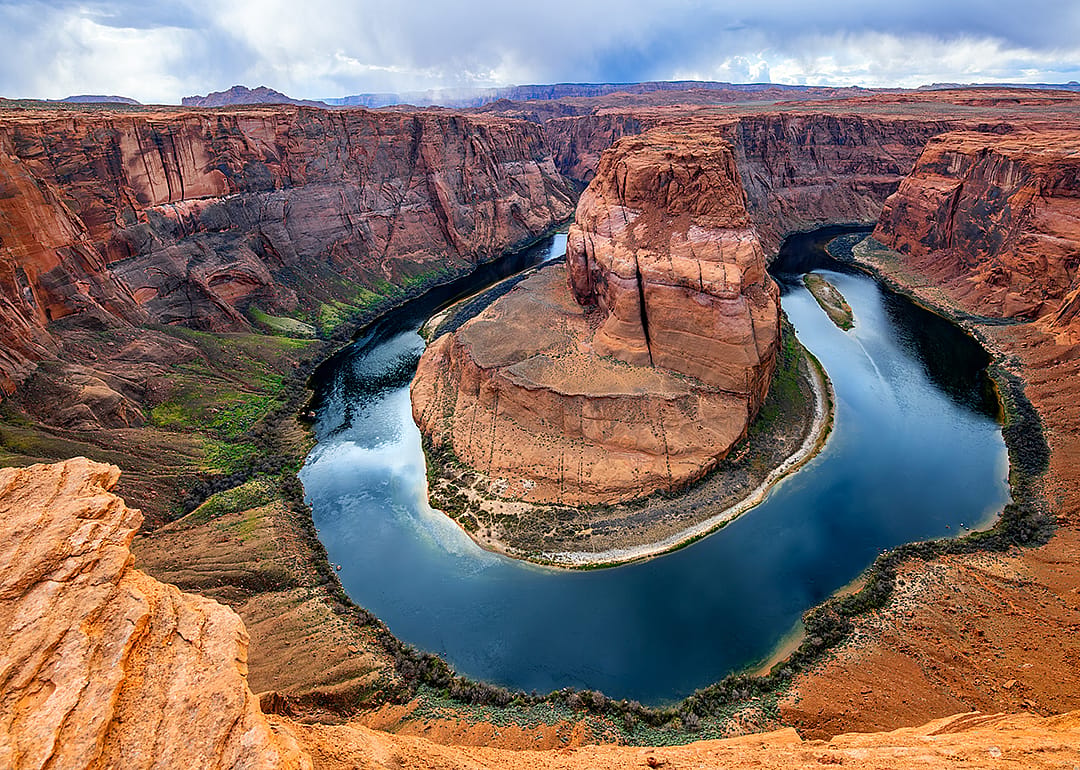 The horseshoe-shaped incised meander of Colorado River near Page, Arizona.