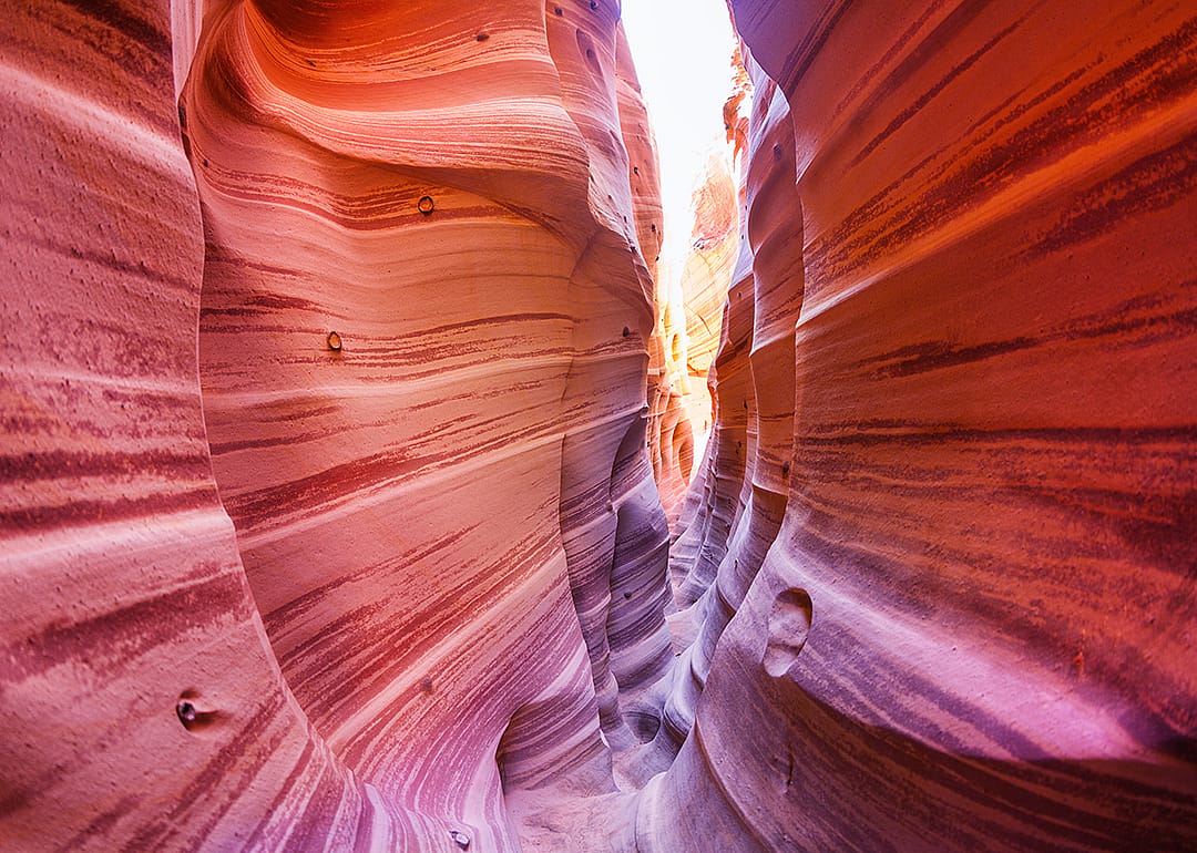 The red waves of sand in Zebra Slot Canyon, Utah.
