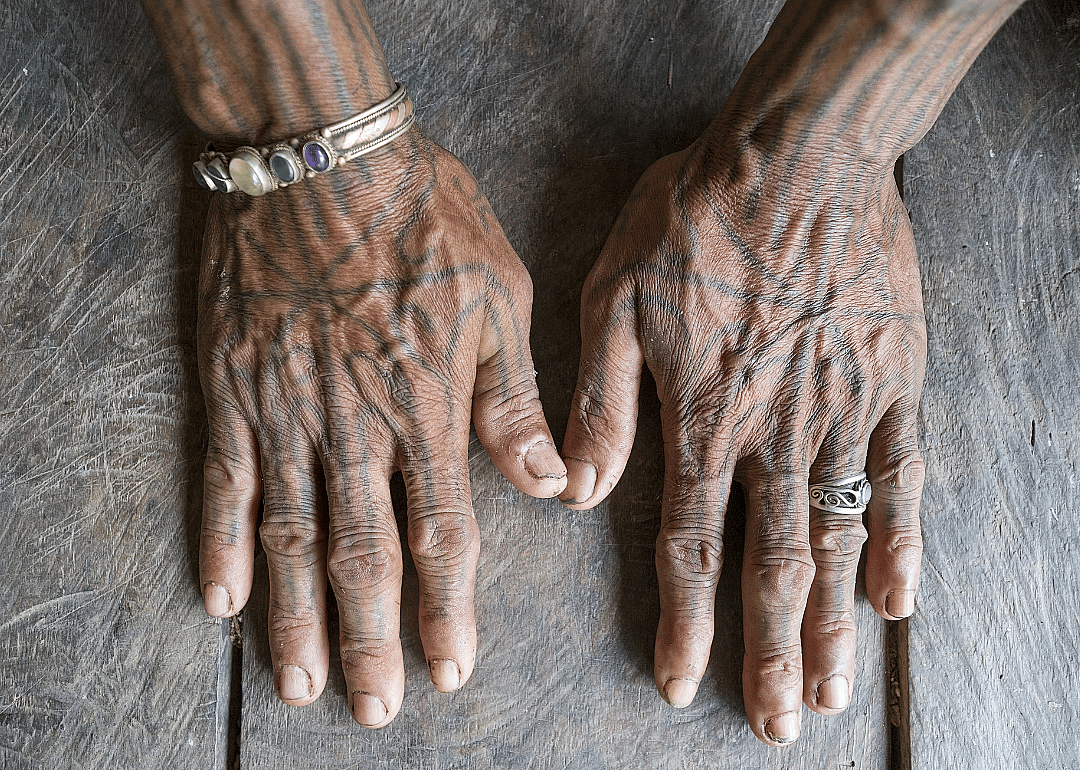 A pair of tattooed hands of someone from the Mentawai Tribe in Muara Siberut, West Sumatera.