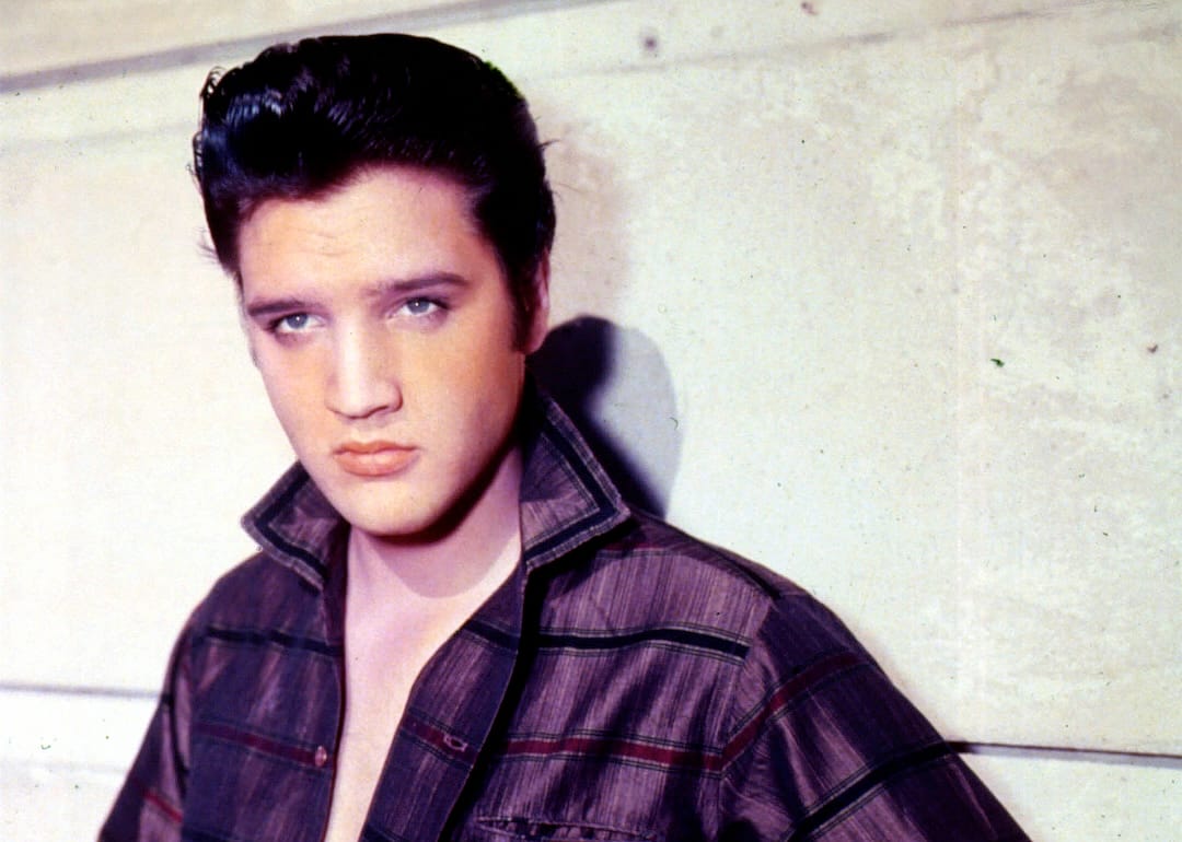 Singer Elvis Presley poses for a studio portrait.