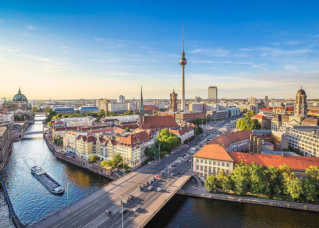 Berlin skyline with tower and Spree river.
