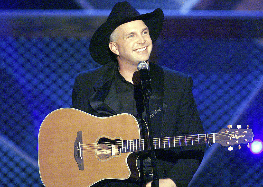 Garth Brooks performing onstage.