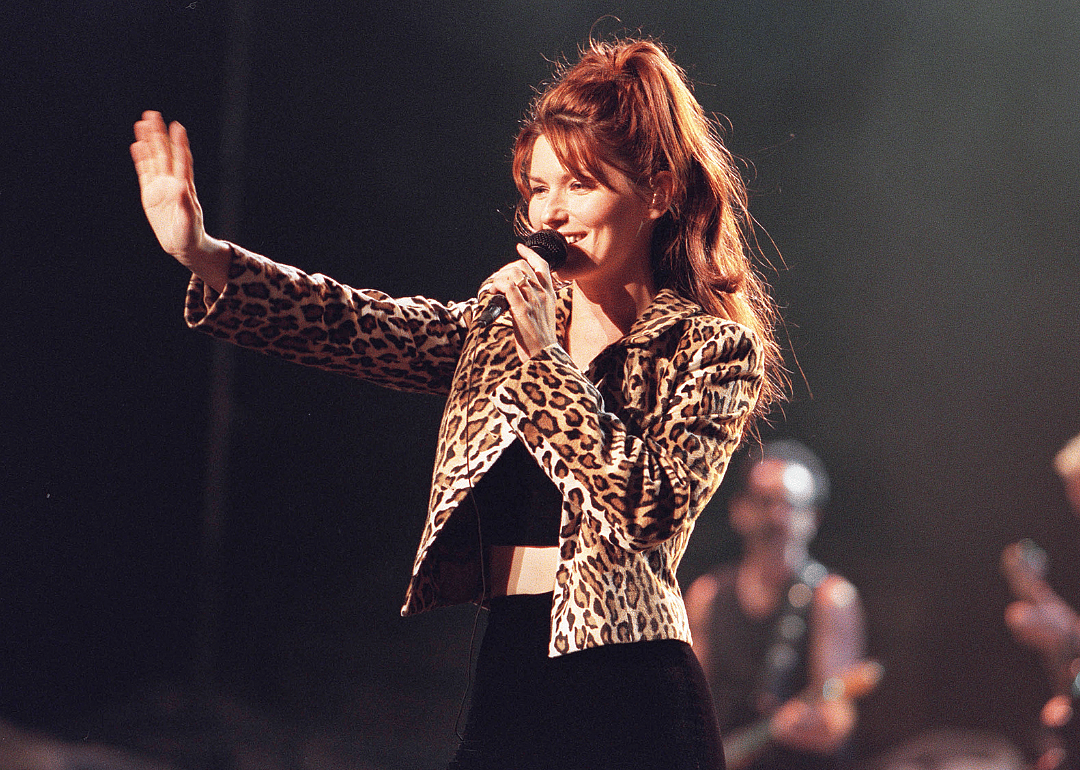 Shania Twain performing onstage.