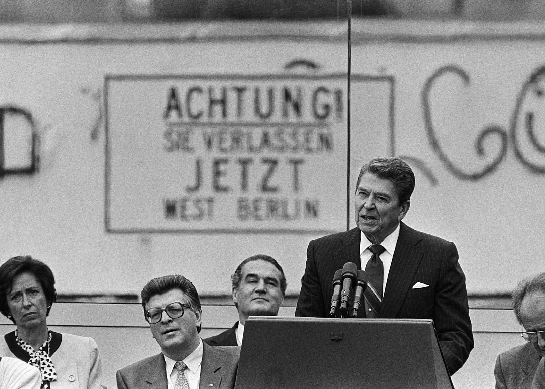 President Ronald Reagan speaking at the Berlin Wall.