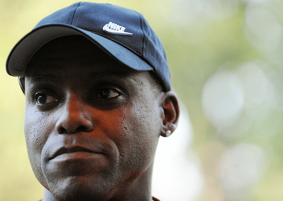 Carl Lewis throws the first pitch