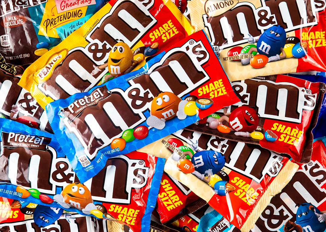 Variety of M&Ms milk chocolate candy packages.