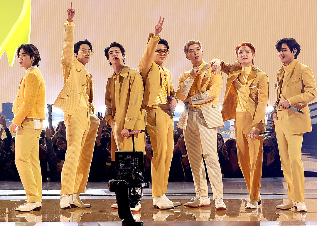 BTS perform onstage during the 2021 American Music Awards.
