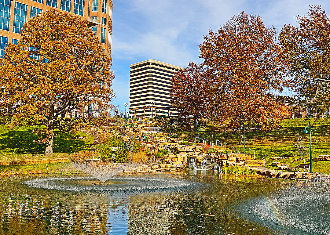 Park with fountain in autumn.