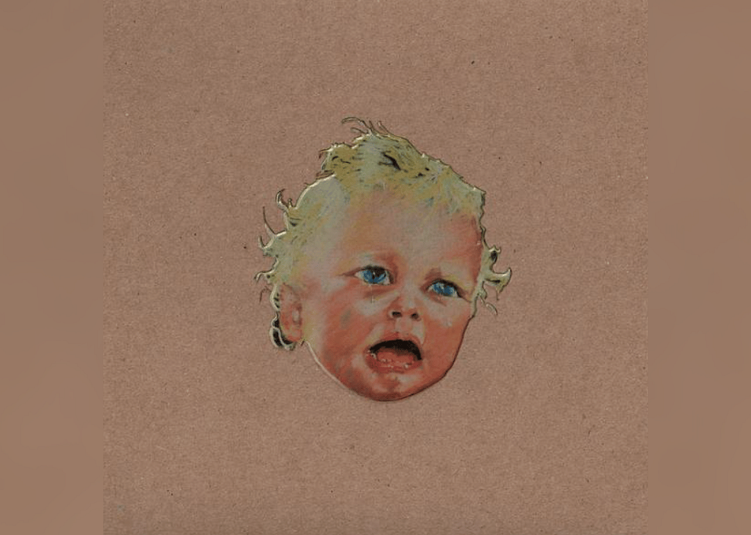 A drawing of a crying baby's head.