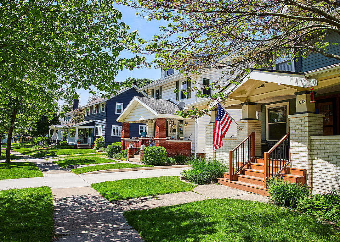 Residential street with homes in summer.