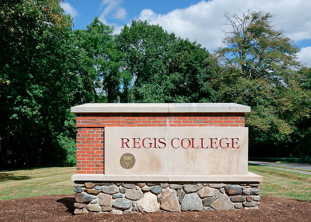 Brick entrance sign to Regis College.