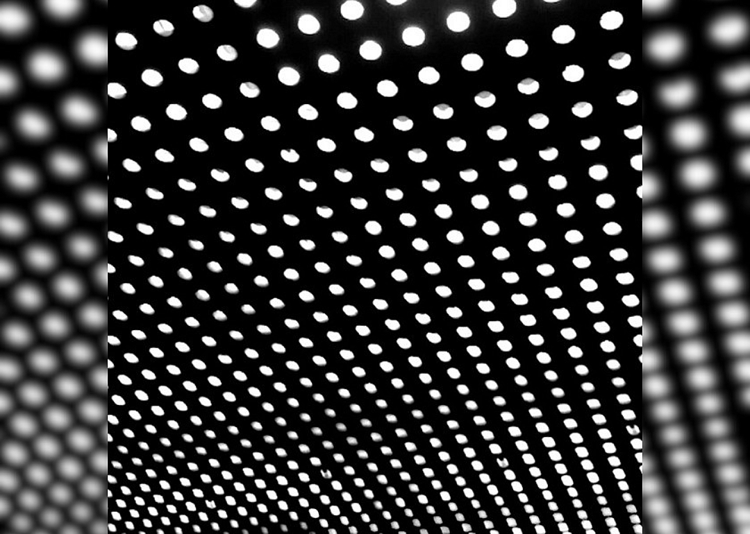 A black background with rows of white circles.