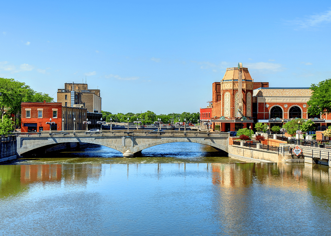 Red brick buildings on the river in Aurora.