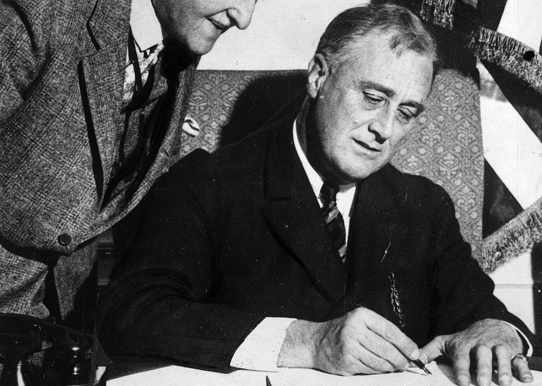 FDR signs a historic document.