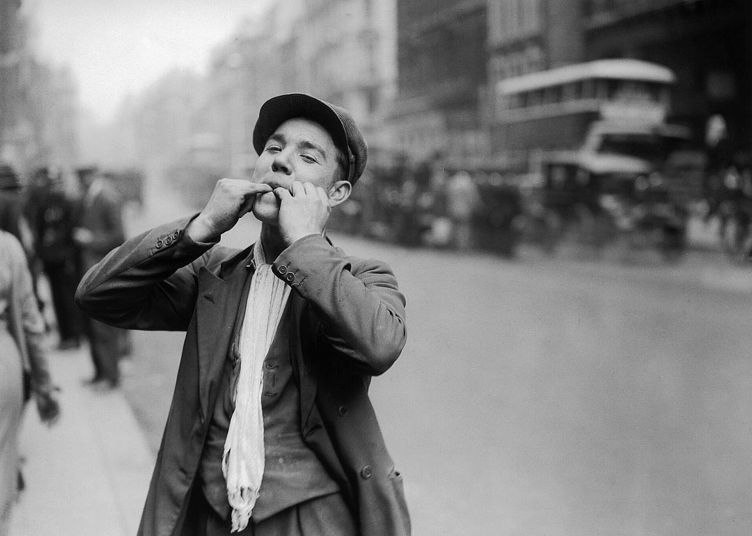 A man whistles to celebrate the end of the Great Depression.