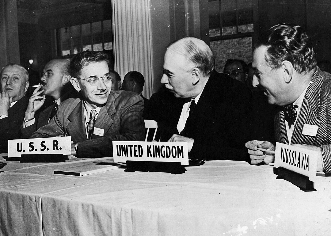 Delegates from the U.S.S.R, the United Kingdom, and Yugoslavia meet at the Bretton Woods Conference in 1944.