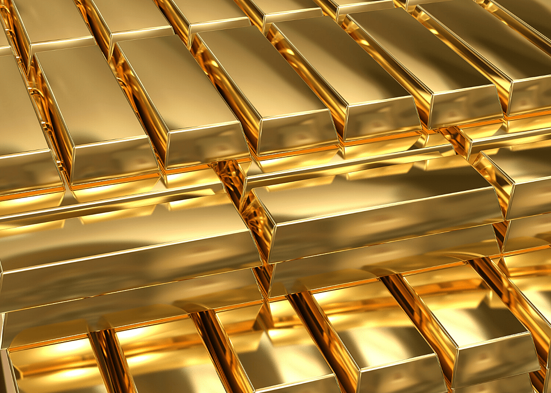 Gold bars stacked for display.
