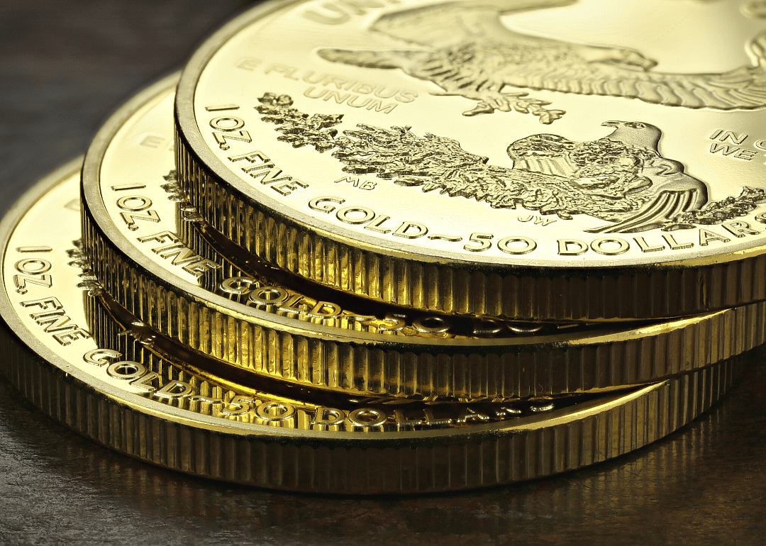 Gold Eagle coins stacked up.