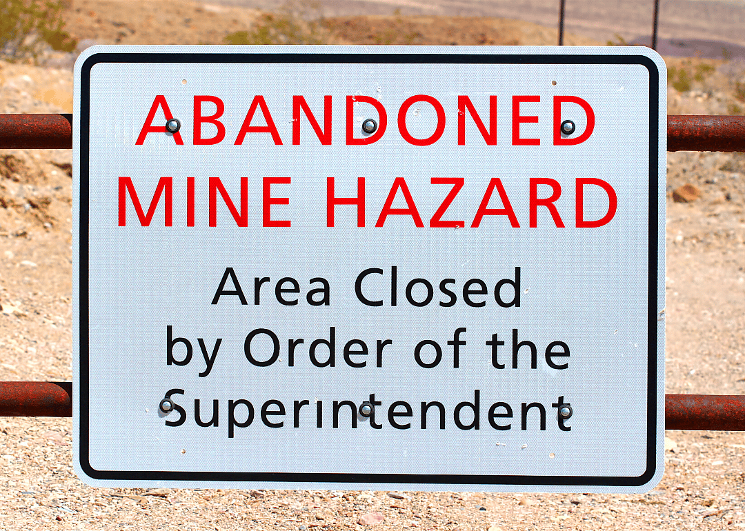 A sign that tells people about the environmental dangers of mining.