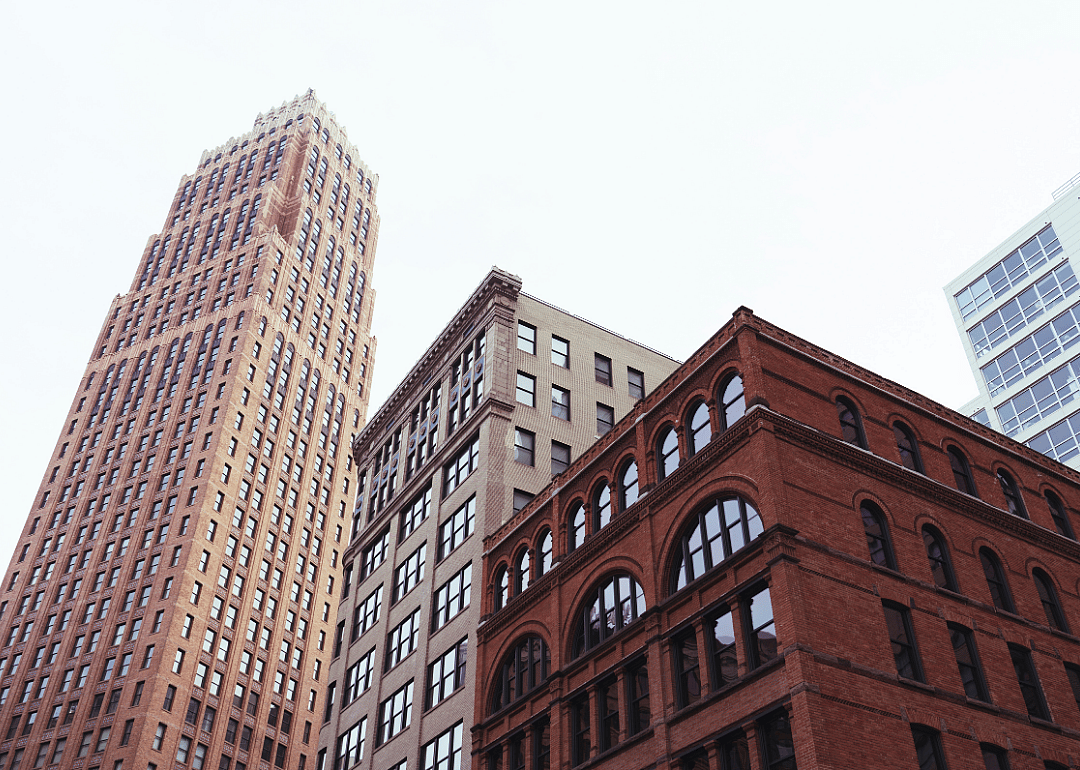 An upward shot of Detroit buildings. 