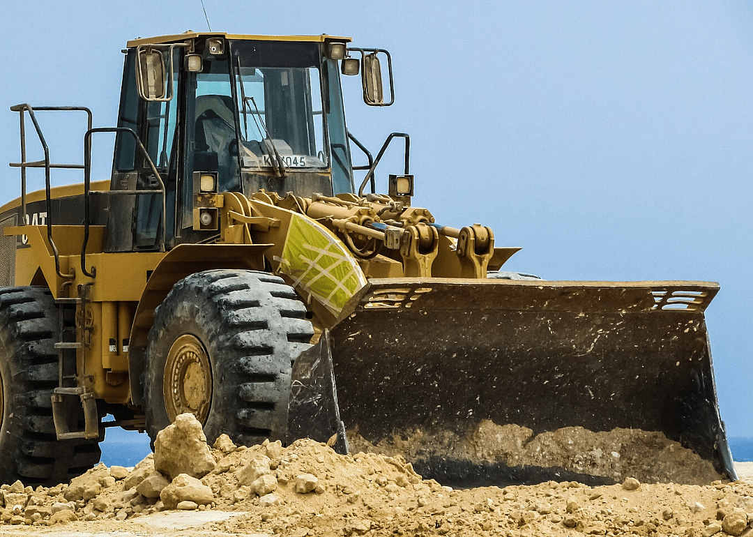 Bulldozers, graders, scrapers