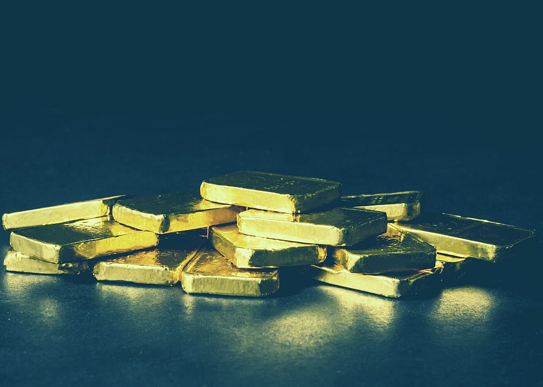Gold bullion bars arranged for display.