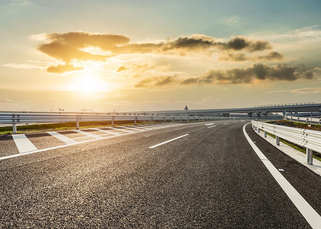 Asphalt highway and beautiful sky cloud landscape at sunset.